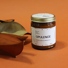 Load image into Gallery viewer, OPULENCE Hand Poured Candle 7 oz. Freshly printed banknotes. Cotton. Ink. Traditional Cotton Wick. Amber Jar.