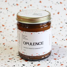 Load image into Gallery viewer, OPULENCE Hand Poured Candle 7 oz. Freshly printed banknotes. Cotton. Ink. Traditional Cotton Wick. Amber Jar.