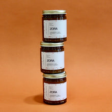 Load image into Gallery viewer, ZORA Hand Poured Candle. Lavender. Pine. Orange. Lemongrass. Cashmere. Musk. 7 oz. Traditional Cotton Wick. Amber Jar.