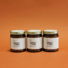 Load image into Gallery viewer, SWEET THING Hand Poured Candle. Muddled Red Fruit. Sugar. Squeezed Lemon. Vanilla. Traditional Cotton Wick. Amber Jar.