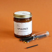 Load image into Gallery viewer, OPULENCE Hand Poured Candle 7 oz. Freshly printed banknotes. Cotton. Ink. Traditional Cotton Wick. Amber Jar.