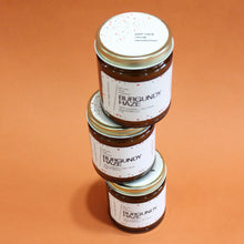 Load image into Gallery viewer, BURGUNDY HAZE Hand Poured Candle. Ripe Cherry. Osmanthus. Saffron. Leather. Apricot. Traditional Cotton Wick. Amber Jar.