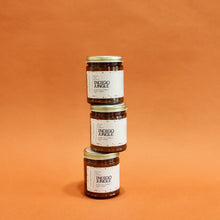 Load image into Gallery viewer, INDIGO JUNGLE Hand Poured Candle. Pomelo. Bergamot. Bamboo. Kush Essence. Fig. 7 oz. Amber Jar. Cotton Wick.