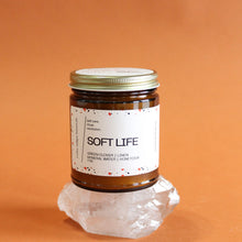 Load image into Gallery viewer, SOFT LIFE Hand Poured Candle. Green Clover. Clean Cotton. Honeydew. Lily of the Valley. Traditional Cotton Wick. Amber Jar.
