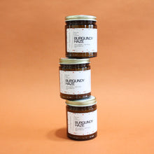 Load image into Gallery viewer, BURGUNDY HAZE Hand Poured Candle. Ripe Cherry. Osmanthus. Saffron. Leather. Apricot. Traditional Cotton Wick. Amber Jar.