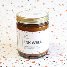Load image into Gallery viewer, INK WELL Hand Poured Candle. Ambrette. Red Grapefruit. Sea Salt. Sage. Traditional Cotton Wick. Amber Jar.
