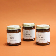Load image into Gallery viewer, ZORA Hand Poured Candle. Lavender. Pine. Orange. Lemongrass. Cashmere. Musk. 7 oz. Traditional Cotton Wick. Amber Jar.