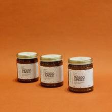 Load image into Gallery viewer, INDIGO JUNGLE Hand Poured Candle. Pomelo. Bergamot. Bamboo. Kush Essence. Fig. 7 oz. Amber Jar. Cotton Wick.