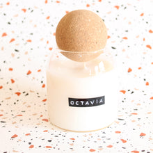 Load image into Gallery viewer, OCTAVIA Hand Poured Candle. Pink Peppercorn. Grapefruit. Plum. Black Rose. Fir. 6.5 oz. Cotton Wick. Cork Top.