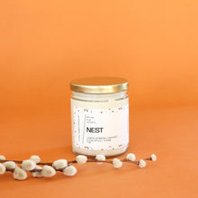 Load image into Gallery viewer, NEST. Lemon Verbena. Thyme. Sea Salt. Eucalyptus. Dune Grass. Coastal Jasmine. 7 oz. Wood Wick.