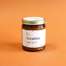 Load image into Gallery viewer, ELEVATED Hand Poured Candle. Vetiver. Dune Grass. Sea Air. Jasmine. Traditional Cotton Wick. Amber Jar.