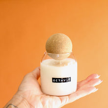 Load image into Gallery viewer, OCTAVIA Hand Poured Candle. Pink Peppercorn. Grapefruit. Plum. Black Rose. Fir. 6.5 oz. Cotton Wick. Cork Top.