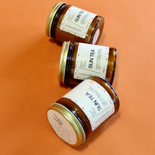 Load image into Gallery viewer, SUN TEA Hand Poured Candle. Lemon Verbena. Rose. Lavender. Bergamot. Vanilla. 7 oz. Cotton Wick.