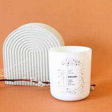 Load image into Gallery viewer, RADIANT Hand Poured Candle. Muguet. Cassis. Cedar. Marigold. Green Wood. Wood Wick. 12 oz. Matte White.