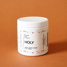 Load image into Gallery viewer, HOLY Hand and Body Lotion. Argan Oil. Sunflower OIl. Carnation. Sandalwood. Musk. 8 oz. SALE