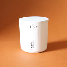Load image into Gallery viewer, BLESS Hand Poured Natural Candle. Palo Santo. Sage. Cedarwood. Wood Wick. 8 oz. White with Lid.