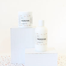 Load image into Gallery viewer, PROTOTYPE Hand and Body Lotion. Marula Oil. Chia Seed Extract. Shea. Aloe. Sweet Cream. Cardamom. Sandalwood. 8 oz.