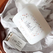 Load image into Gallery viewer, CENTRAL PARK WEST Hand Poured Candle. Mahogany. Teak. Lavender. Magnolia. Wood Wick. 12 oz. Matte White.