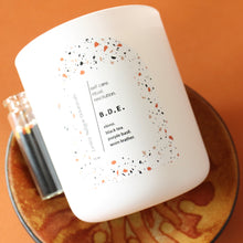 Load image into Gallery viewer, B.D.E. Hand Poured Candle. Elemi. Black Tea. Tobacco. Scotch. Wood Wick. 12 oz. Matte White.