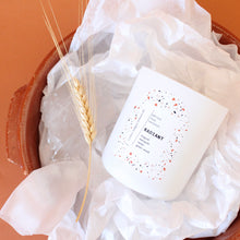 Load image into Gallery viewer, RADIANT Hand Poured Candle. Muguet. Cassis. Cedar. Marigold. Green Wood. Wood Wick. 12 oz. Matte White.