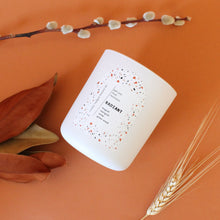 Load image into Gallery viewer, RADIANT Hand Poured Candle. Muguet. Cassis. Cedar. Marigold. Green Wood. Wood Wick. 12 oz. Matte White.