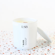 Load image into Gallery viewer, BLESS Hand Poured Natural Candle. Palo Santo. Sage. Cedarwood. Wood Wick. 8 oz. White with Lid.