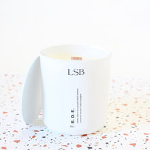 Load image into Gallery viewer, B D E Hand Poured Candle. Leather. Ginger. Cedar. Scotch. Coconut. Vetiver. Purple Basil. 8 oz.