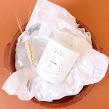 Load image into Gallery viewer, RADIANT Hand Poured Candle. Muguet. Cassis. Cedar. Marigold. Green Wood. Wood Wick. 12 oz. Matte White.