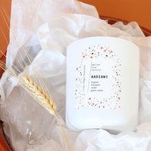 Load image into Gallery viewer, RADIANT Hand Poured Candle. Muguet. Cassis. Cedar. Marigold. Green Wood. Wood Wick. 12 oz. Matte White.