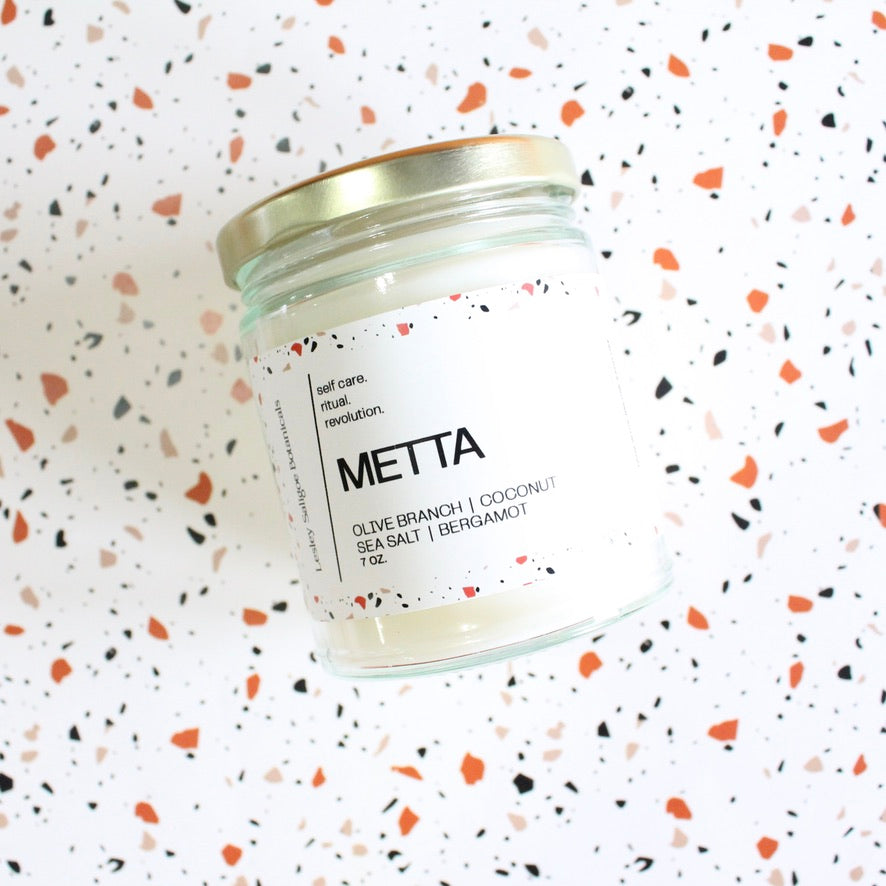 METTA Hand Poured Candle. Olive Branch. Coconut. Bergamot. Cassis. Coriander. Salt Air. Thyme. 7 oz. Cotton Wick.