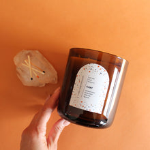 Load image into Gallery viewer, FLOAT Hand Poured Candle. Smoked Violet. Mate Tea. Fig Pulp. Tonka. Jasmine. 22 oz. Triple Cotton Wick. Amber.