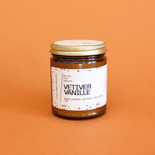 Load image into Gallery viewer, VETIVER VANILLE Hand Poured Candle. Vetiver. Vanilla Cream. Red Cedar. Amber Resin. Ozonic Air. Tree Moss. Traditional Cotton Wick. Amber Jar.