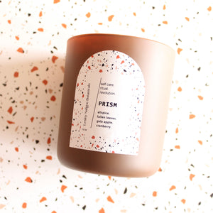 PRISM Hand Poured Candle. Cranberry Sauce. Crunchy Leaves. Apple Peel. Cotton Wick. 12 oz. Cocoa Brown. Large.