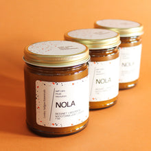 Load image into Gallery viewer, NOLA Hand Poured Candle. Bourbon. Beignet. Nicotiana Leaf. Amber Resin. 7 oz. Cotton Wick.