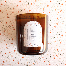 Load image into Gallery viewer, FLOAT Hand Poured Candle. Smoked Violet. Mate Tea. Fig Pulp. Tonka. Jasmine. 22 oz. Triple Cotton Wick. Amber.