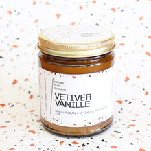 Load image into Gallery viewer, VETIVER VANILLE Hand Poured Candle. Vetiver. Vanilla Cream. Red Cedar. Amber Resin. Ozonic Air. Tree Moss. Traditional Cotton Wick. Amber Jar.