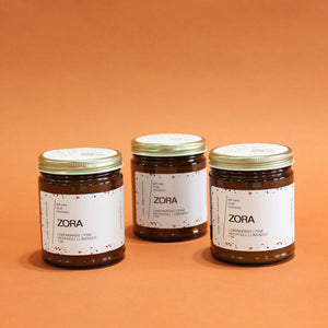 ZORA Hand Poured Candle. Lavender. Pine. Orange. Lemongrass. Cashmere. Musk. 7 oz. Traditional Cotton Wick. Amber Jar.