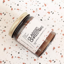 Load image into Gallery viewer, CLASSIC CHRISTMAS Hand Poured Candle. Blue Spruce. Lemon Rind. Cypress Tips. Crushed Eucalyptus. Balsam Boughs.  Traditional Cotton Wick. Amber Jar. SALE.