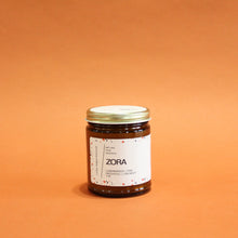 Load image into Gallery viewer, ZORA Hand Poured Candle. Lavender. Pine. Orange. Lemongrass. Cashmere. Musk. 7 oz. Traditional Cotton Wick. Amber Jar.