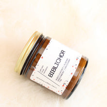 Load image into Gallery viewer, BIBLICHOR Hand Poured Candle. Aged Leather. Mahogany. Parchment. Almond Crema. Vanilla. Sandalwood. Library Scent. Books. Traditional Cotton Wick. Amber Jar.