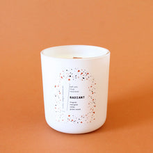 Load image into Gallery viewer, RADIANT Hand Poured Candle. Muguet. Cassis. Cedar. Marigold. Green Wood. Wood Wick. 12 oz. Matte White.