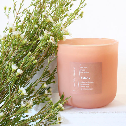 TIDAL Hand Poured Candle. Calabrian Lemon. Green Lilac. Jade Water. Spanish Juniper. 14 oz. Deep Peach Matte. Large.