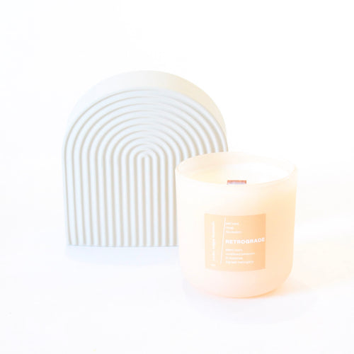 RETROGRADE Hand Poured Candle. Wood Wick. Elemi Resin. Lit Matches. Unrefined Beeswax. Big Leaf Mahogany. 14 oz. Blush Peach Matte. Large.
