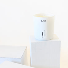 Load image into Gallery viewer, BLESS Hand Poured Natural Candle. Palo Santo. Sage. Cedarwood. Wood Wick. 8 oz. White with Lid.