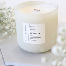 Load image into Gallery viewer, MOONLIT Hand Poured Candle. Night Queen Jasmine. Braided Sweetgrass. Buddha&#39;s Hand. Musc Blanc. Wood Wick. 14 oz. Matte Cream. Large.
